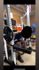 Fitness Gear squat rack with 300 lbs of weights, Olympic lifting bar, and bench