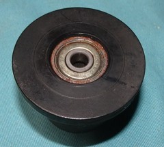 lot of 4 black rollers with spacers for Total Gym