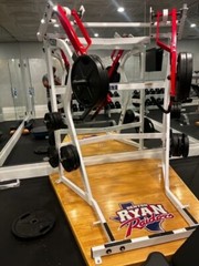 Hammer Strength Jammer Machine with weights-flooring