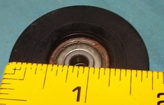 lot of 4 black rollers with spacers for Total Gym