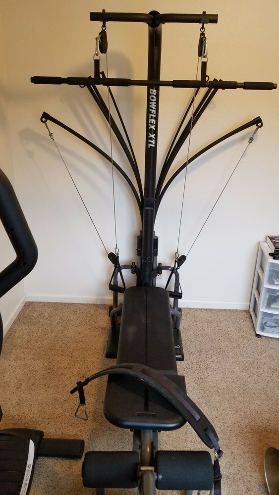 Bowflex XTL with 310 lbs of Power Rods, Lat and Leg Attachment Included