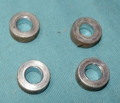 lot of 4 black rollers with spacers for Total Gym
