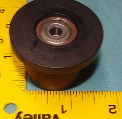 lot of 4 black rollers with spacers for Total Gym