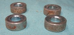 lot of 4 black rollers with spacers for Total Gym