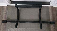 Free weight stand can hold up to 300lbs. & Sturdy pull-up bar with foam grips.
