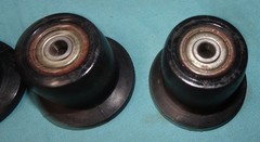 lot of 4 black rollers with spacers for Total Gym